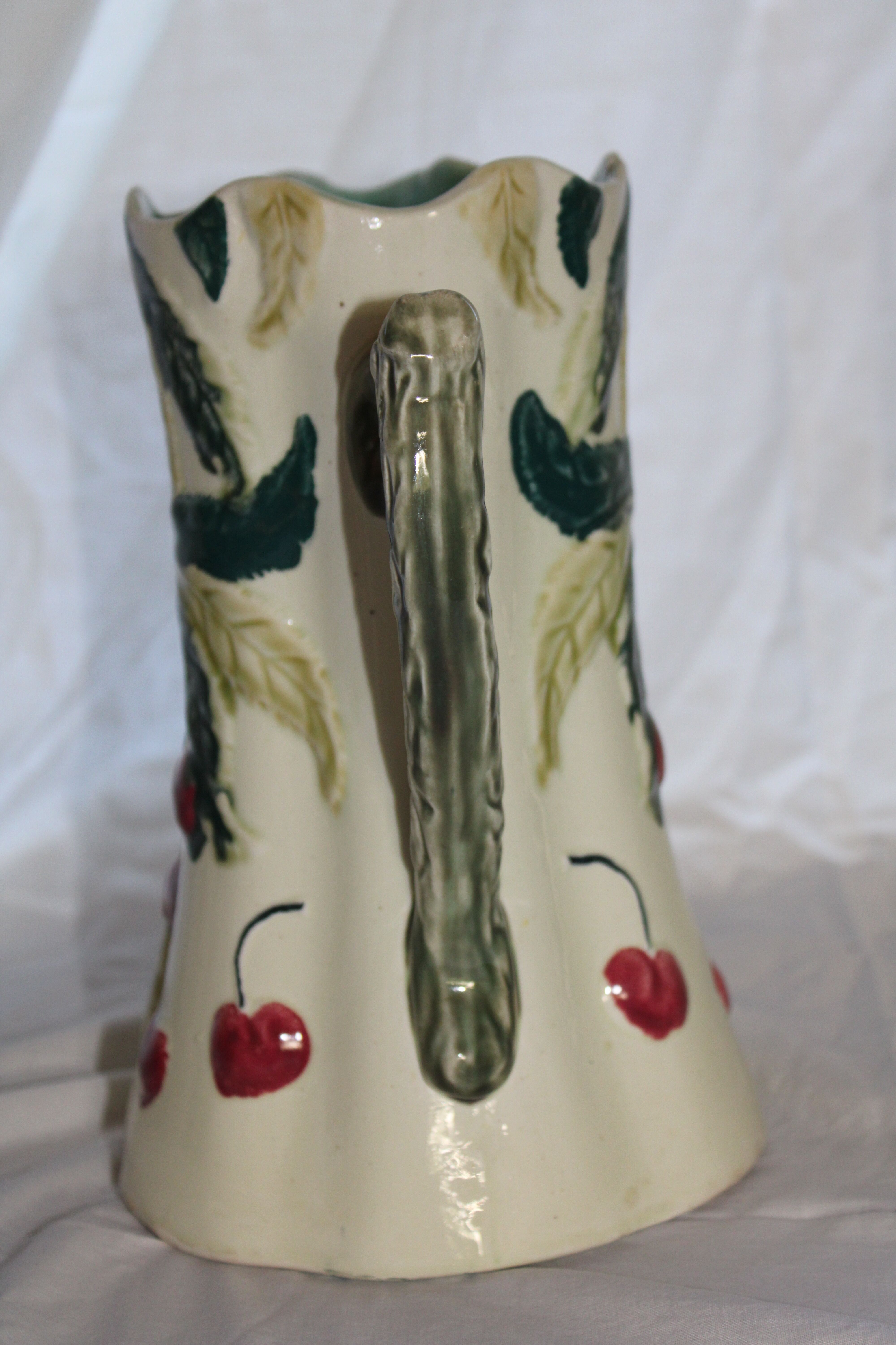 Ancient pitcher in earthenware decoration cherry Saint Amand waters