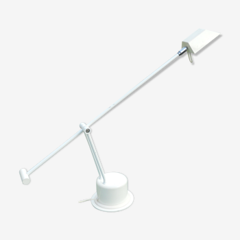 Massive swing desk lamp has two lights and a kneecap