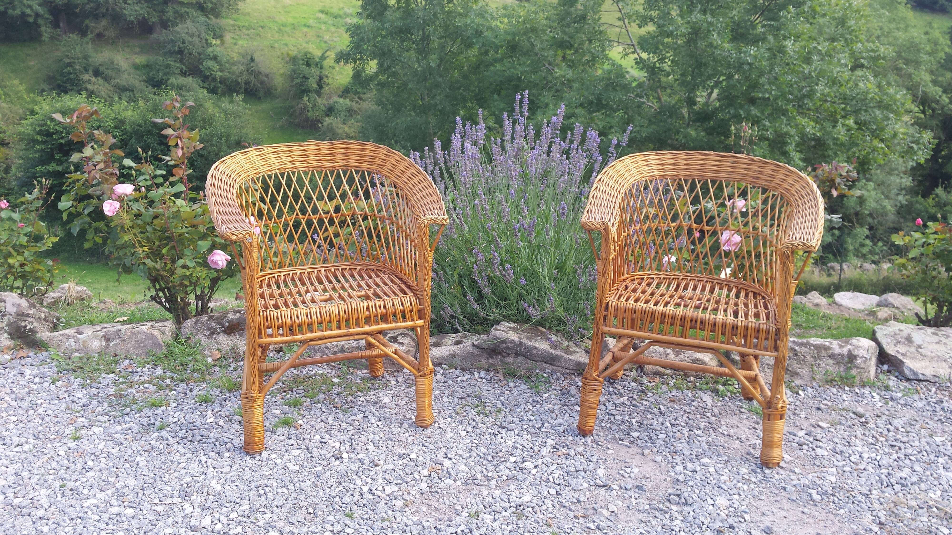 Wicker or rattan armchairs