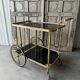 Vintage black and gold rolling trolley