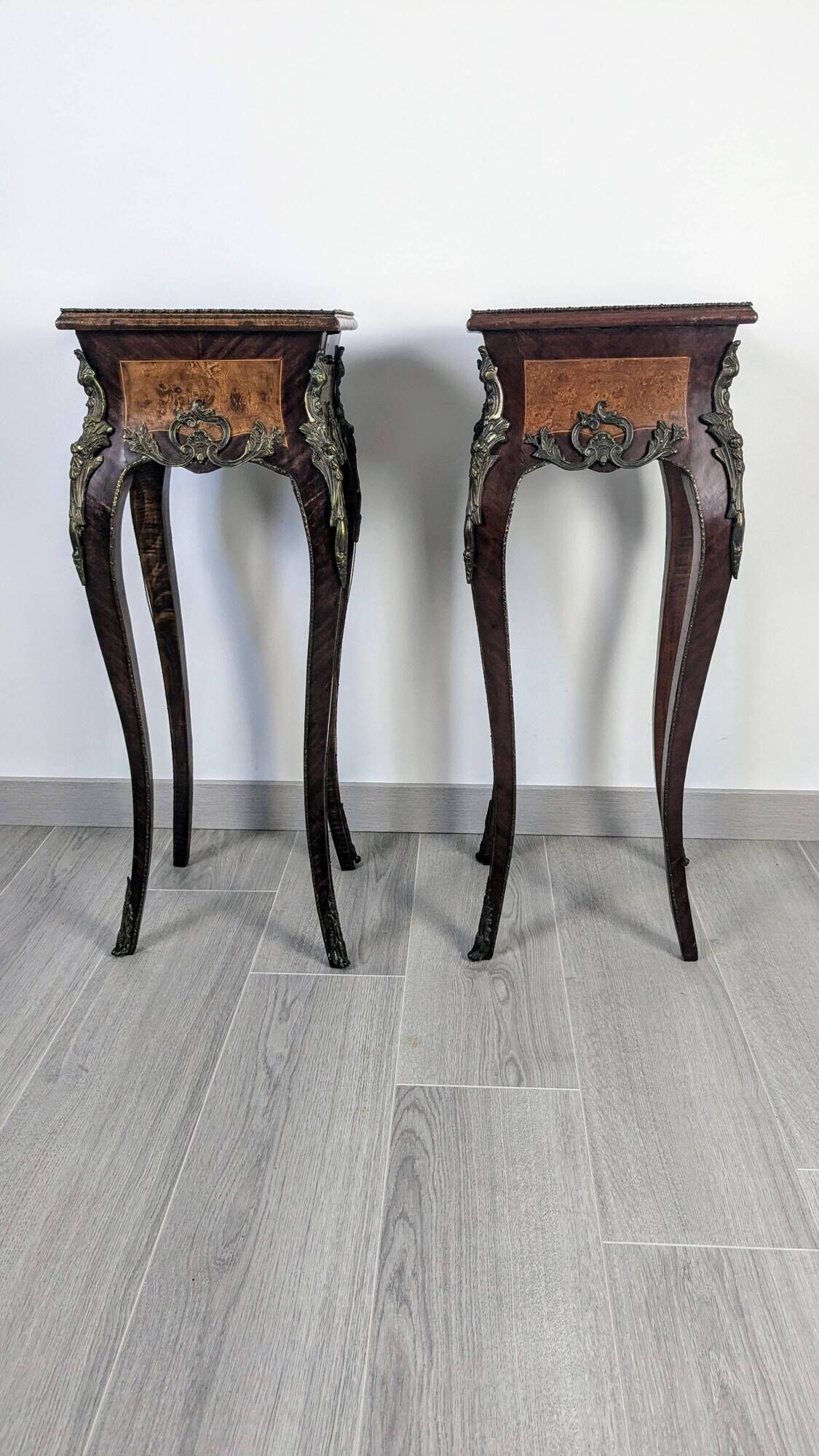 Pair of Louis XV bedside tables with marquetry and gilded bronzes