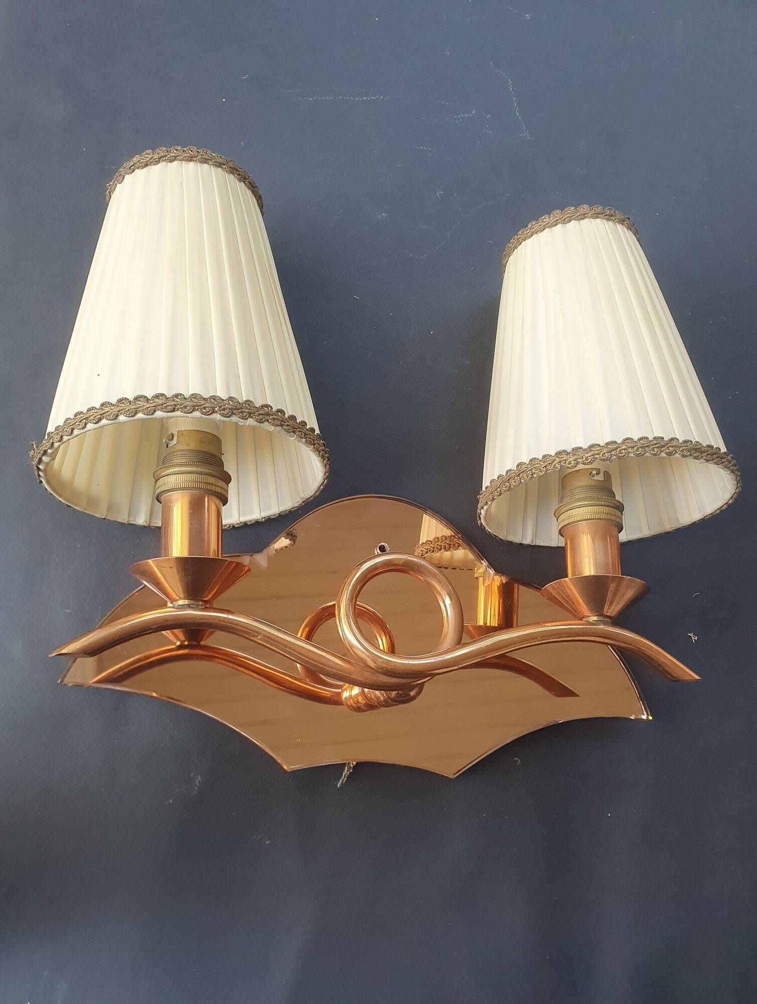 Copper wall lamp with 1940s Art Deco shades.