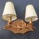 Copper wall lamp with 1940s Art Deco shades.