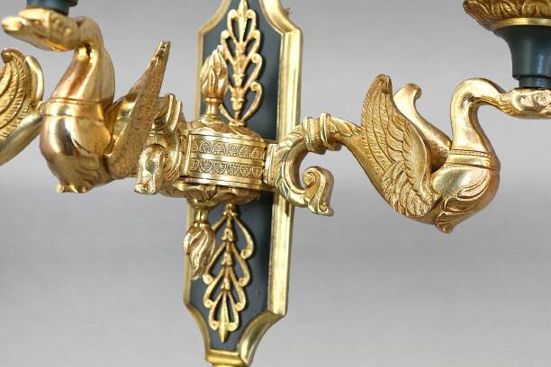 Pair of gold bronze wall lights in Empire style with three lights "Lucien Gau"