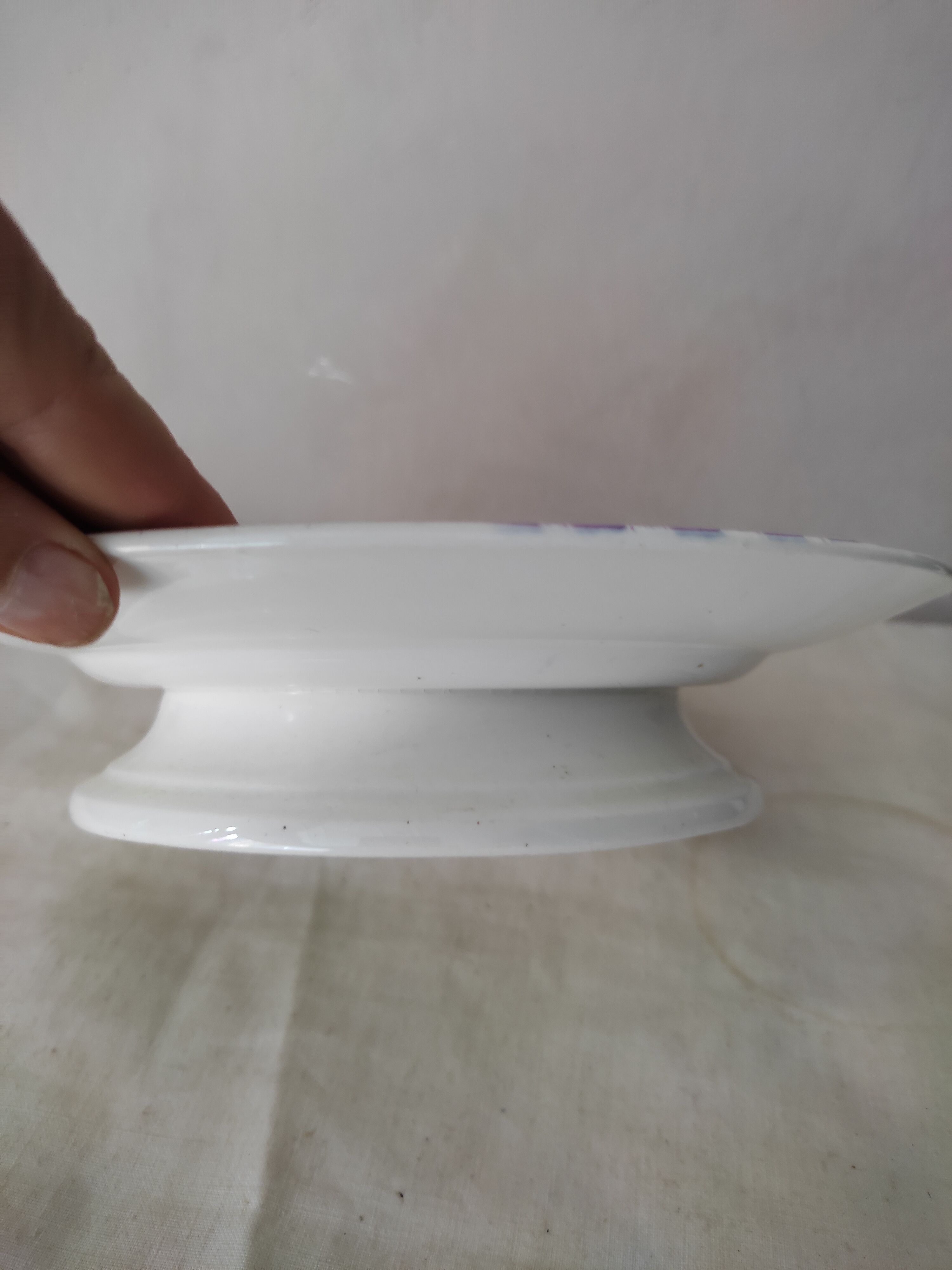 Presentation plate on foot shower