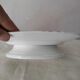 Presentation plate on foot shower