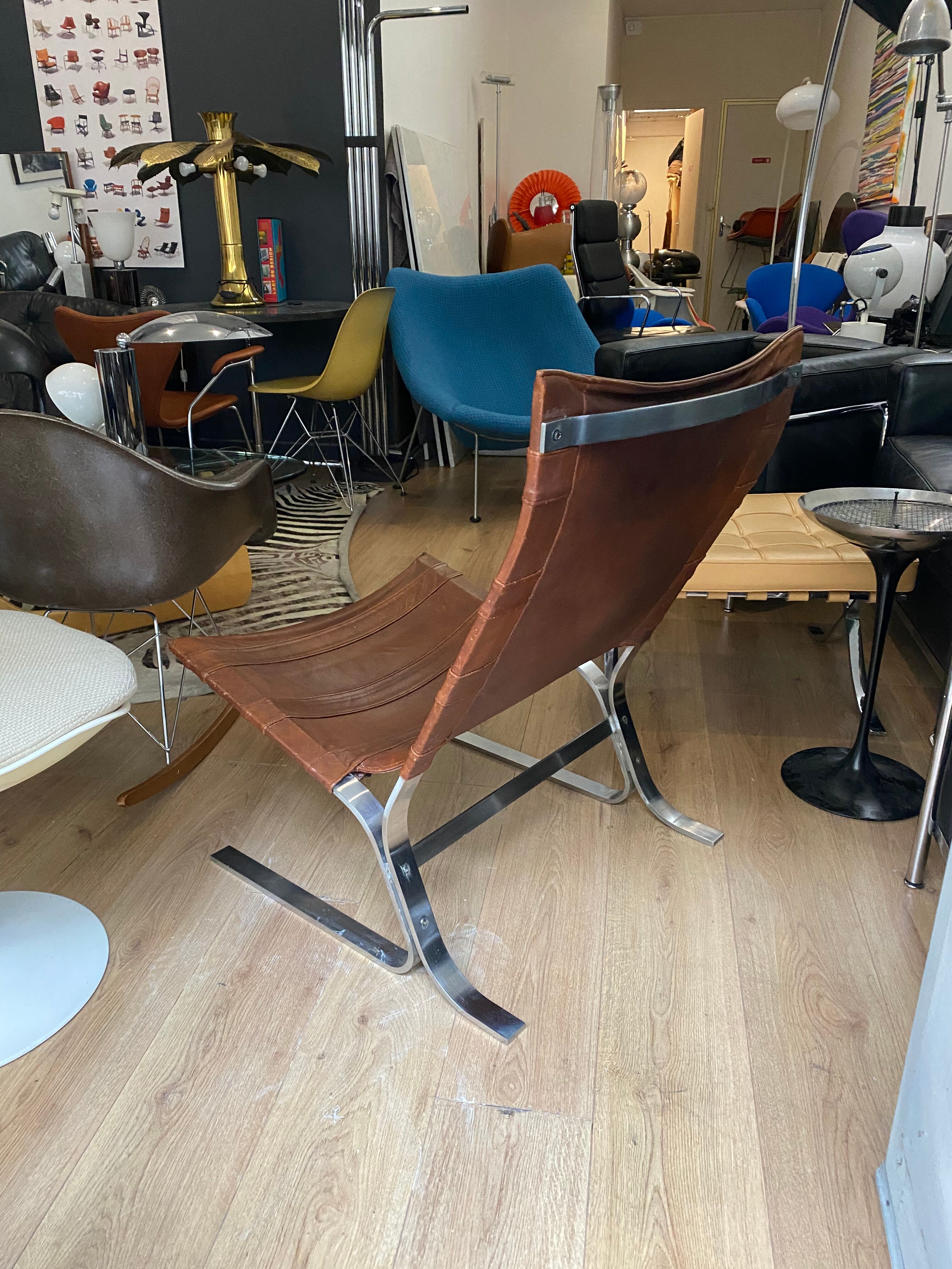 Vintage armchair design steel and leathers stretched 70s