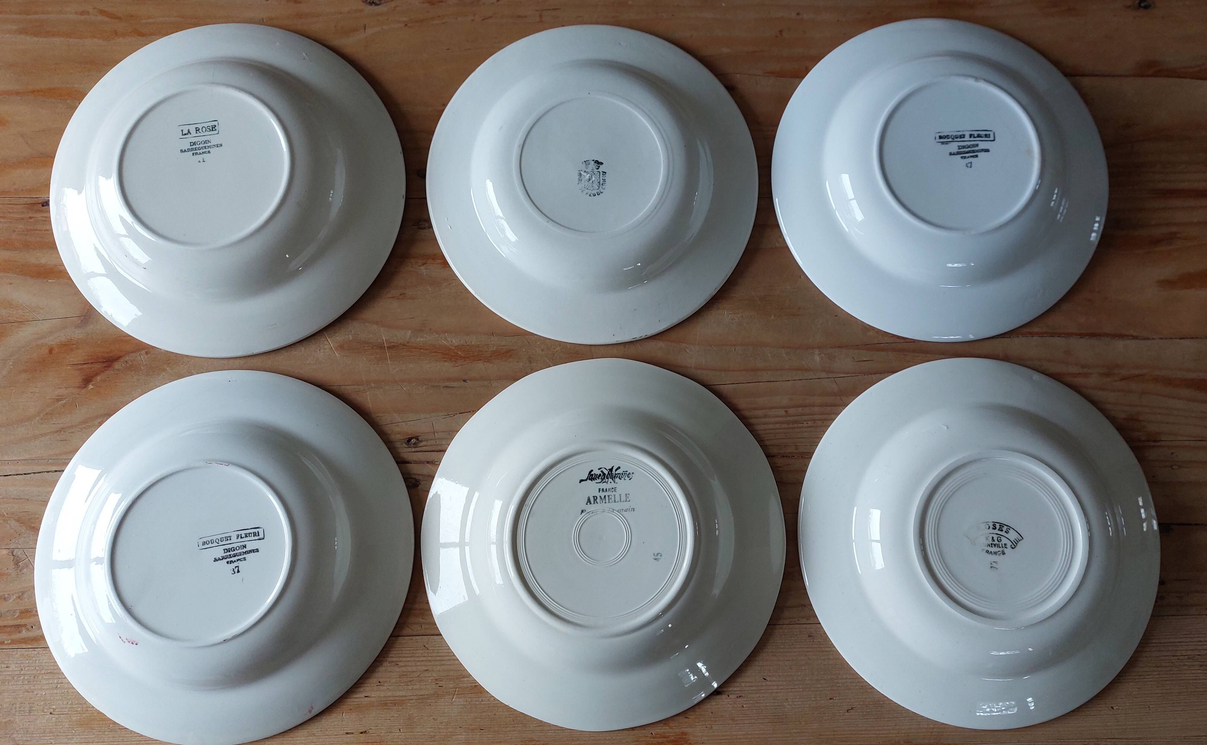 mismatched lot 6 stamped soup plates