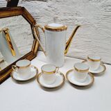 White and gold porcelain coffee maker and cups