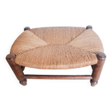 Low wooden stool and straw