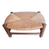 Low wooden stool and straw