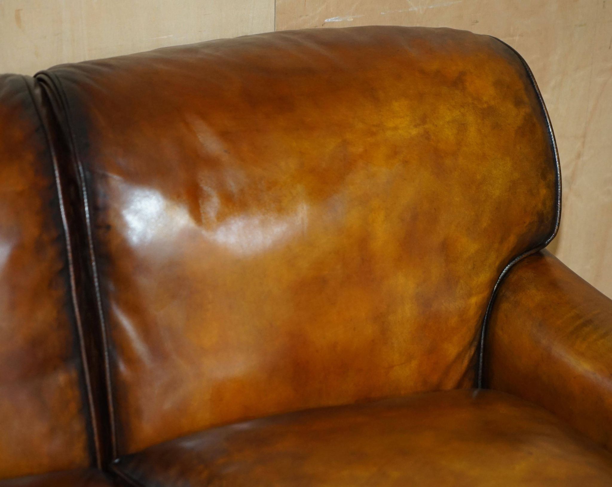 Howard & Son restored leather canapé, width 145 cm