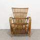 Vintage armchair from the 70s in natural rattan.