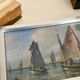 “Port Breton” oil, 1940s, under glass