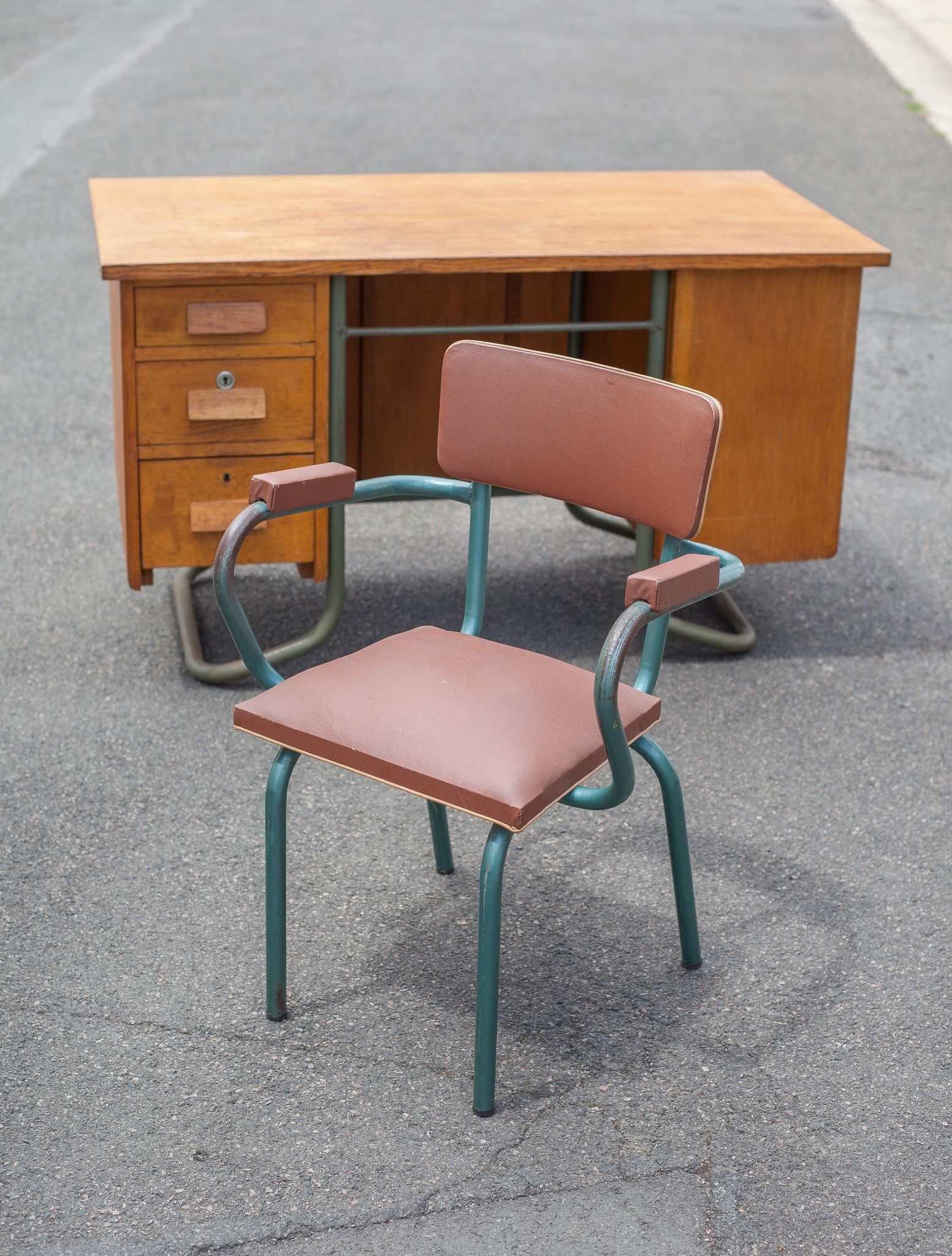 School teacher's chair in imitation leather and tubular metal