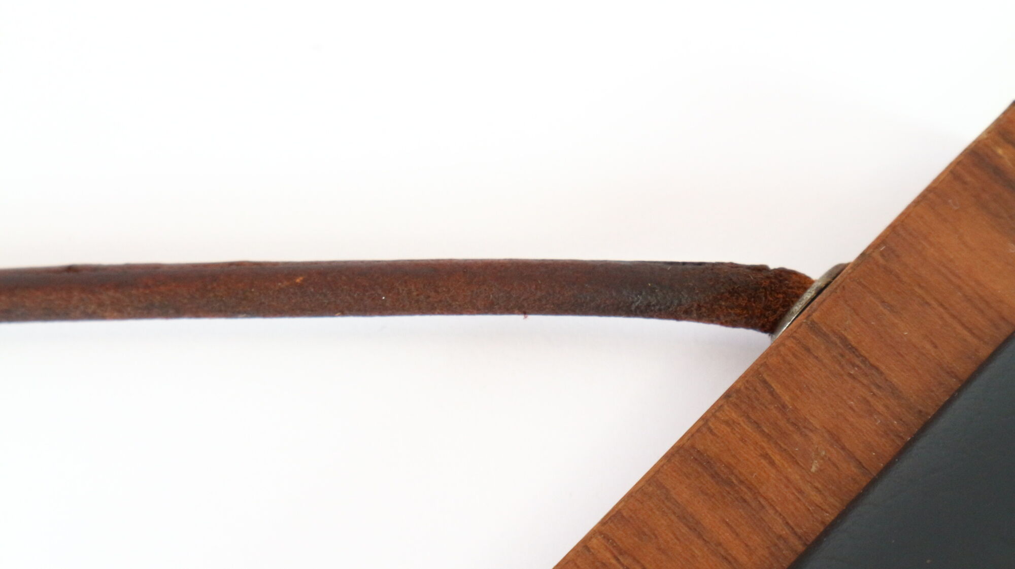 Two coat hangers, wood, leather and black leather, 70s