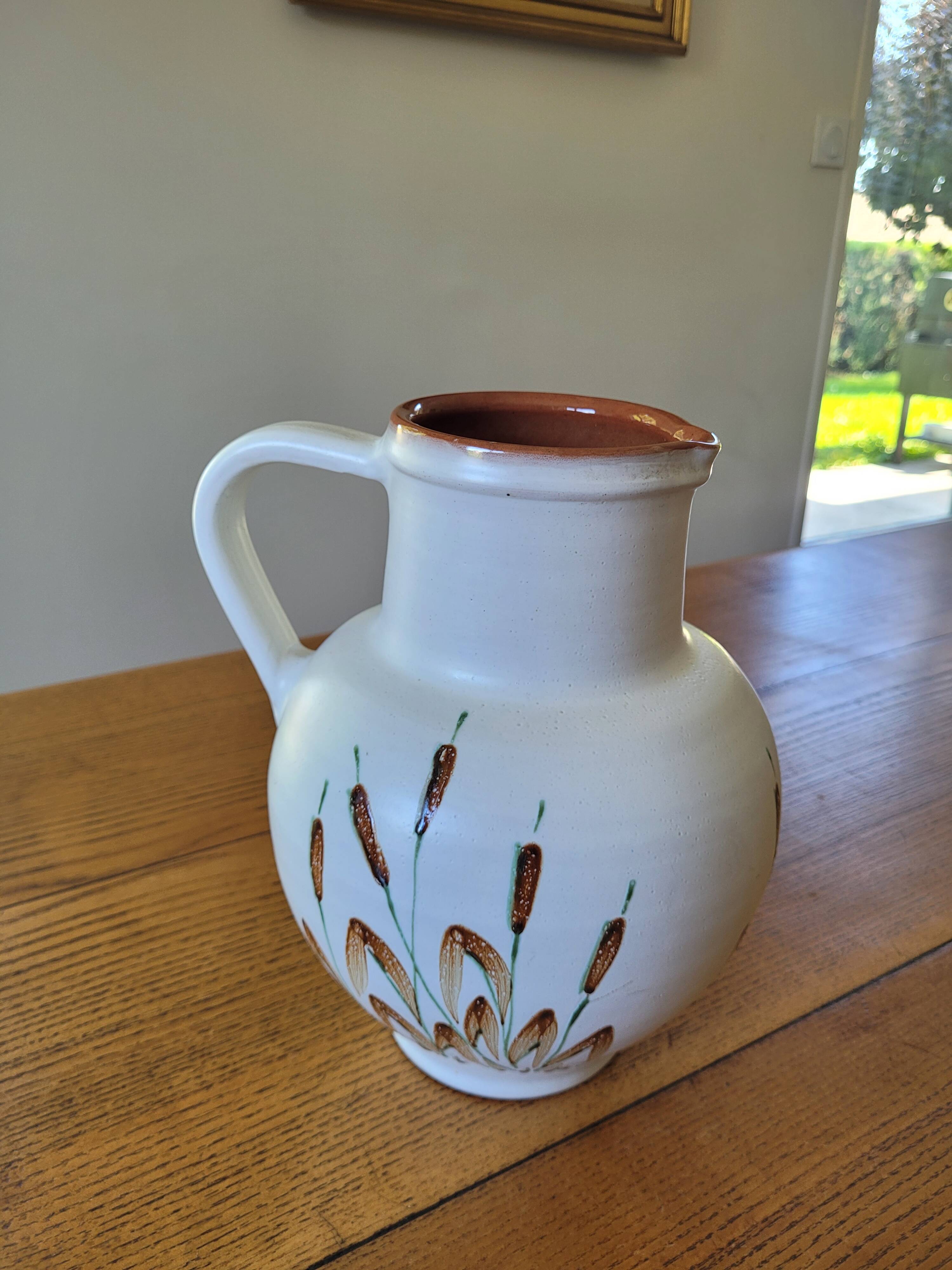 XL ceramic pitcher signed