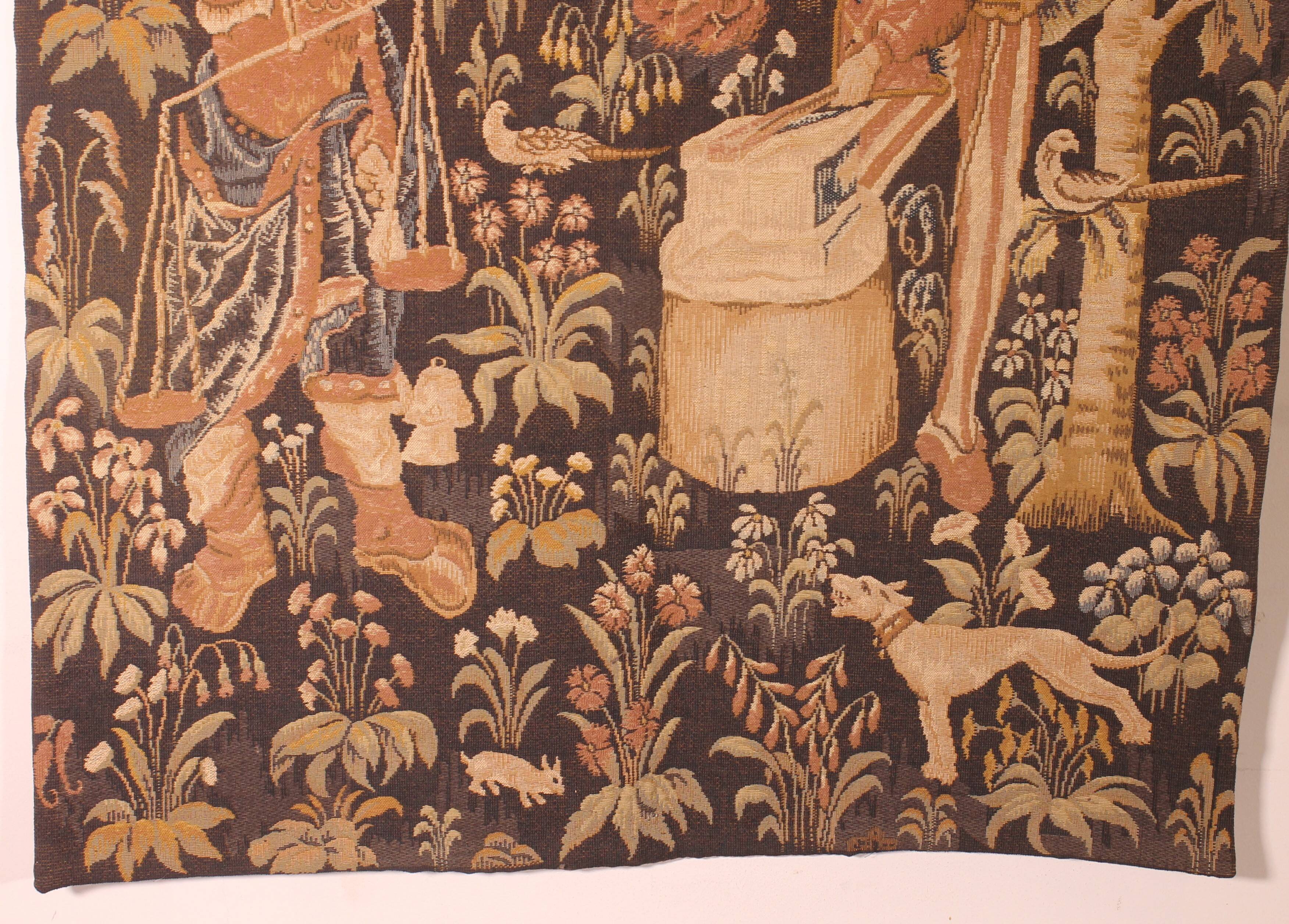 tapisserie représentant la pesée et l'art de forger