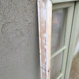Old window mounted as a fenestron