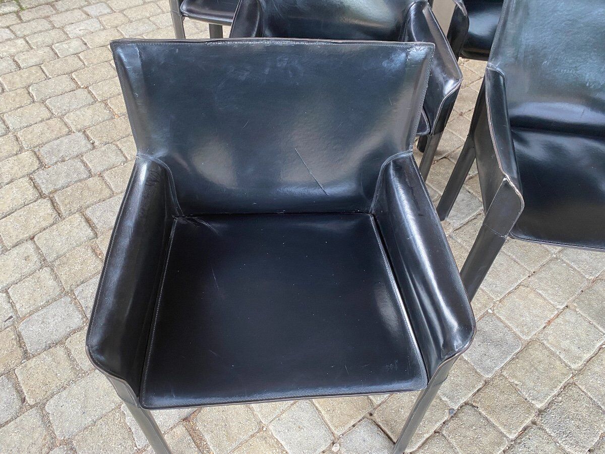 7 armchairs by Couro Brasil in Black Leather