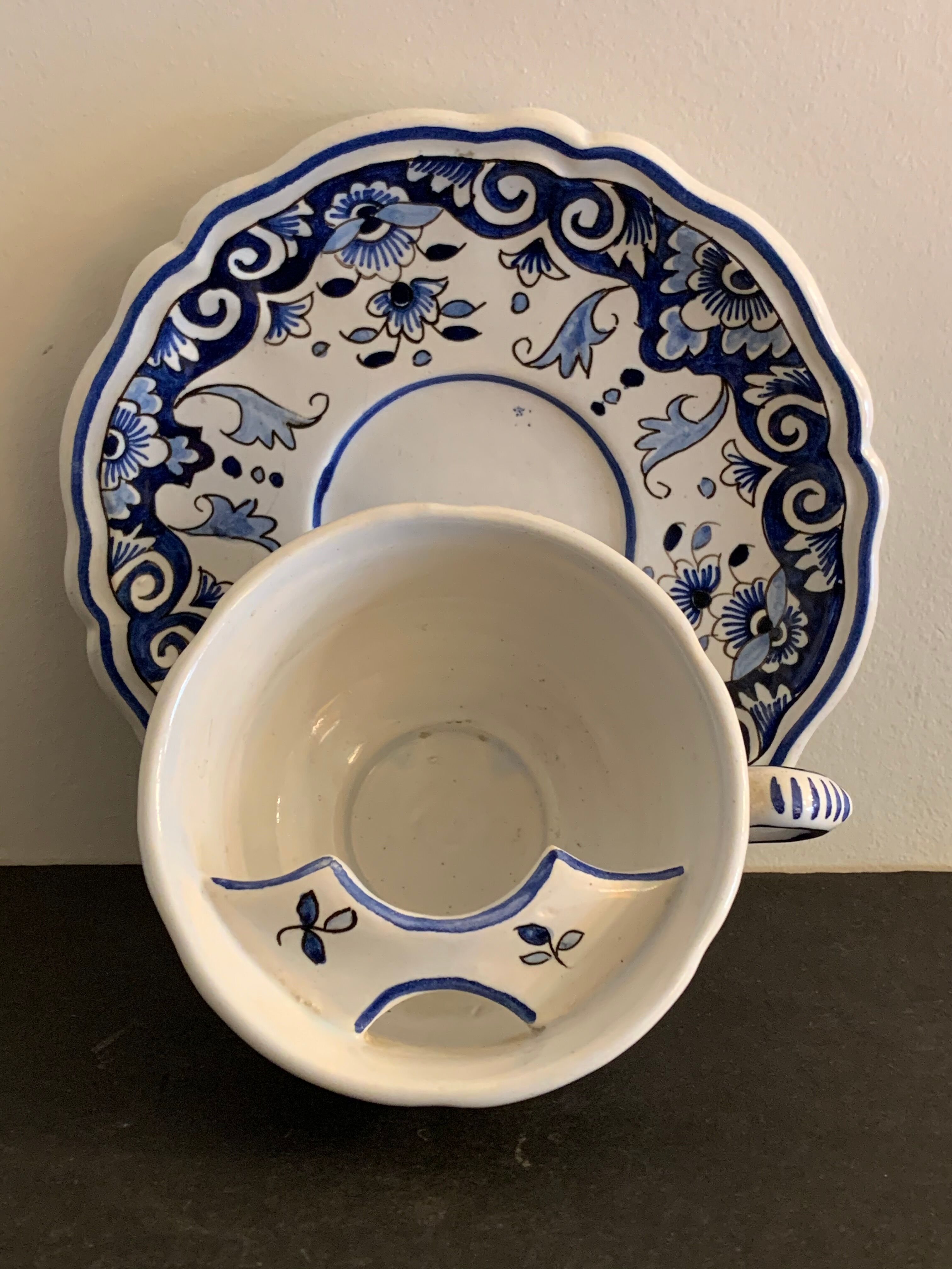 Old mustache cup and its under cup, Rouen earthenware