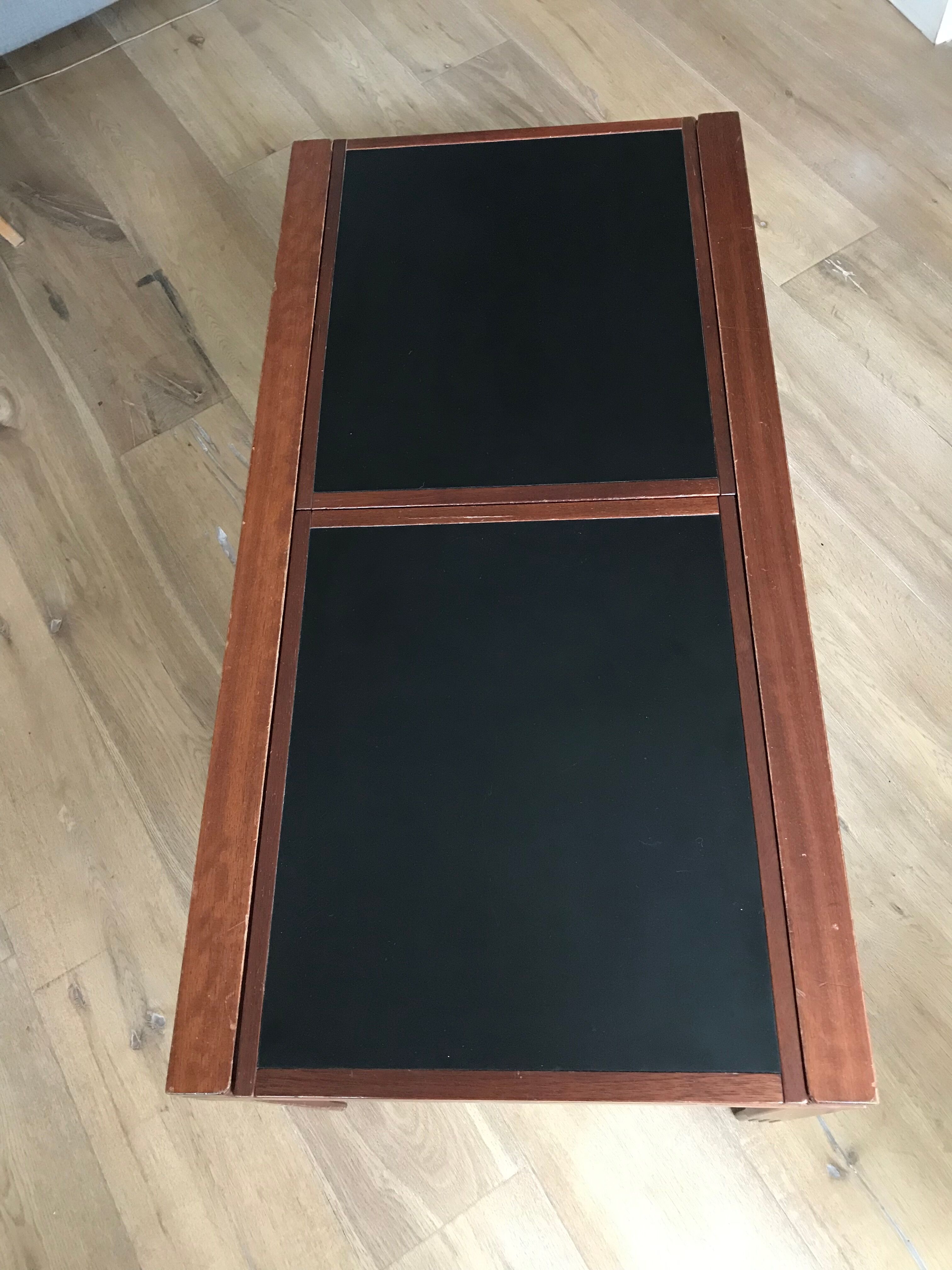Coffee table with sliding tops