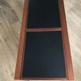 Coffee table with sliding tops