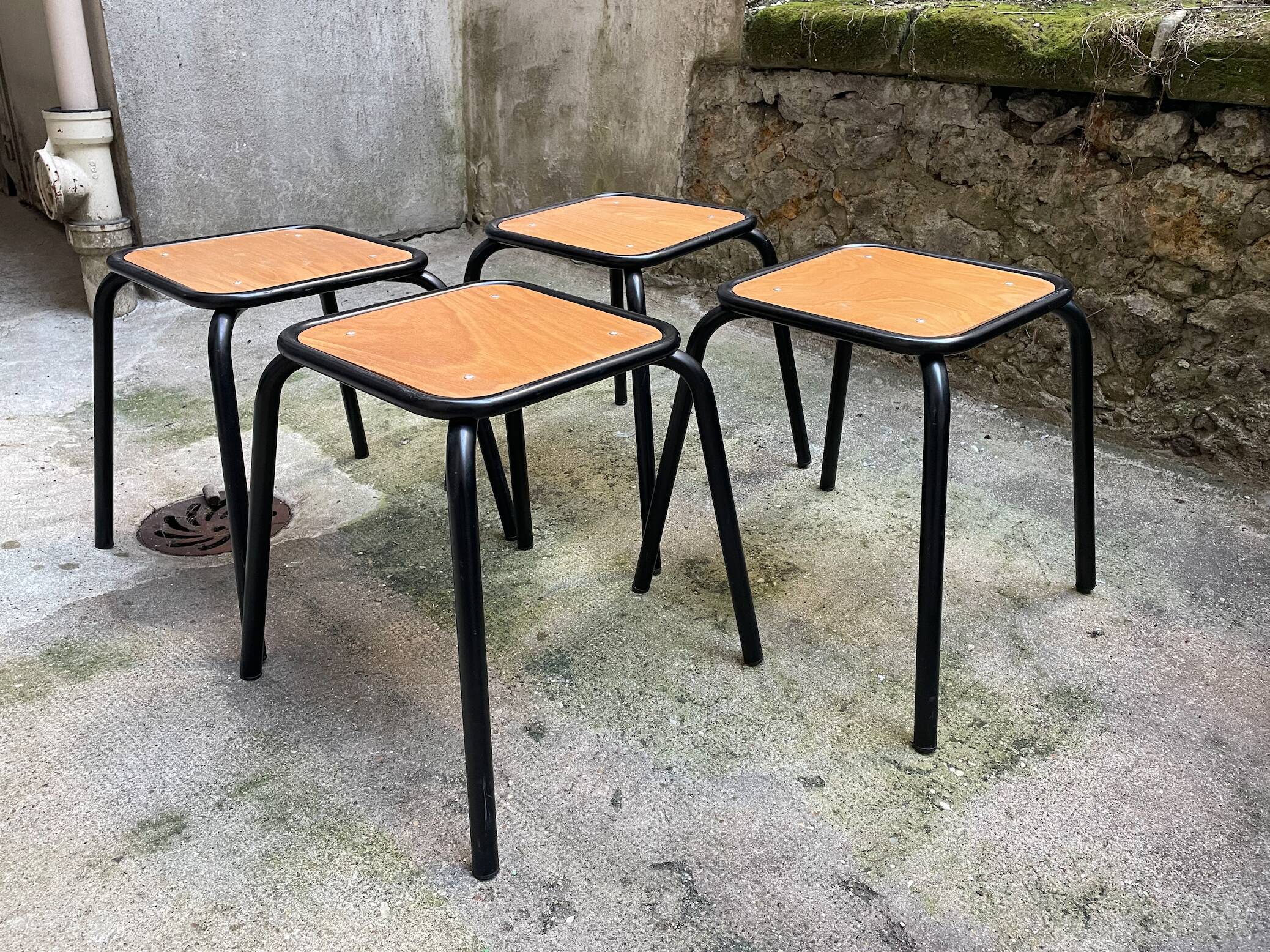 4 black school stools