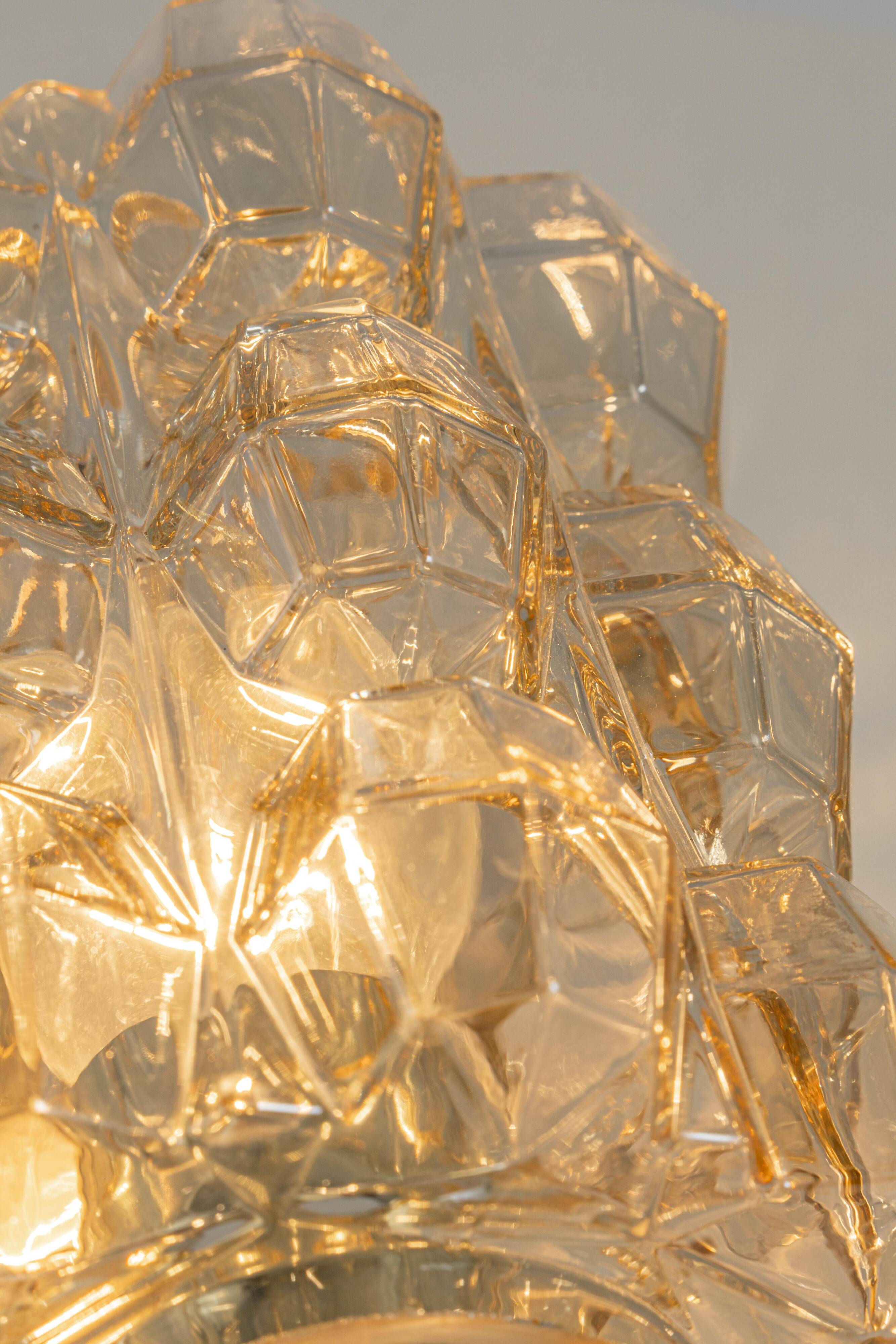 Large amber wall lamp in bubble glass by Helena Tynell, Limburg, Germany.