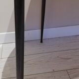 Wood-colored formica dining table