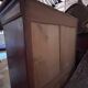 Secretary desk with mahogany and flame veneer.