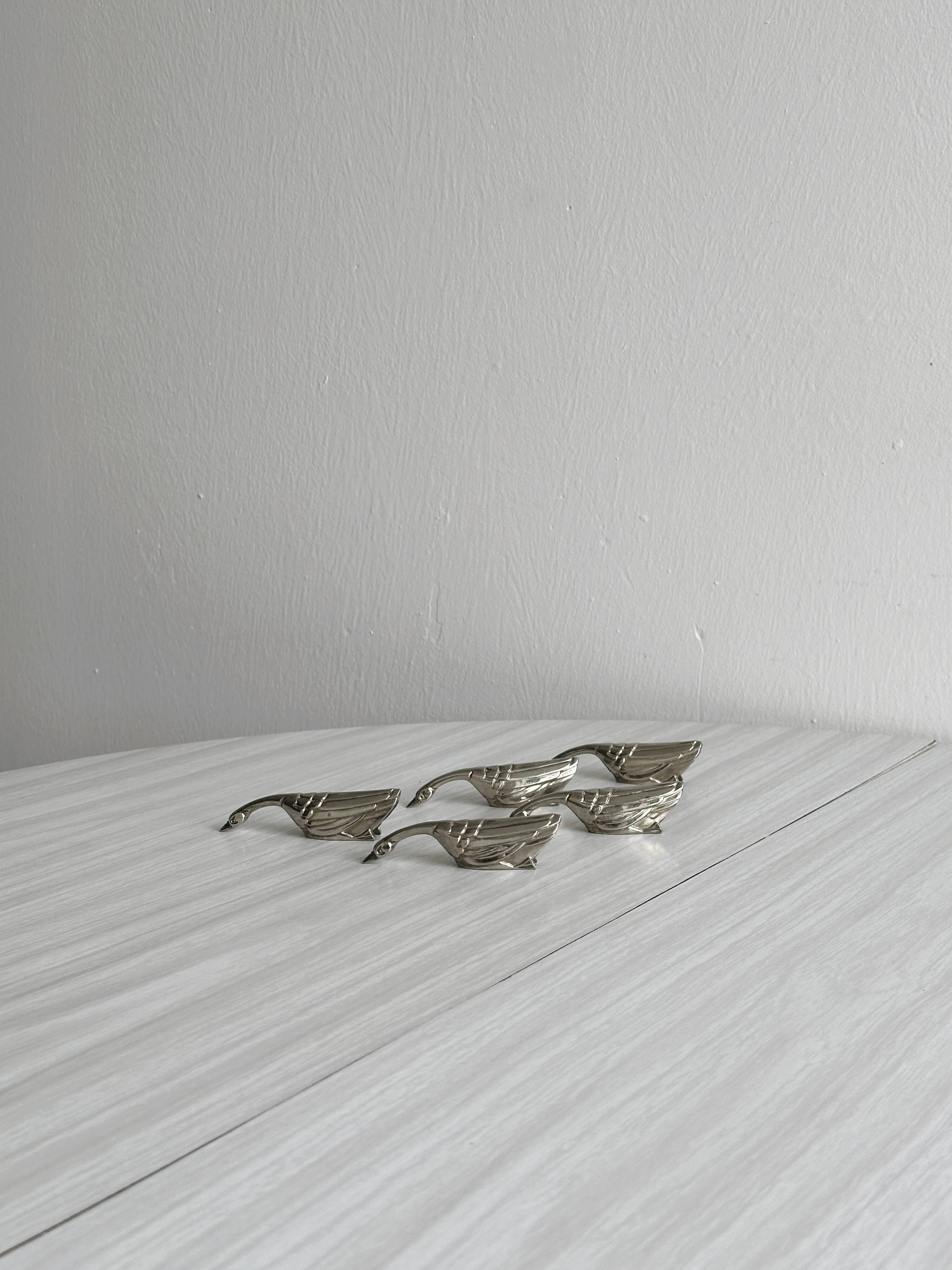 Set of 5 antique goose-shaped knife rests