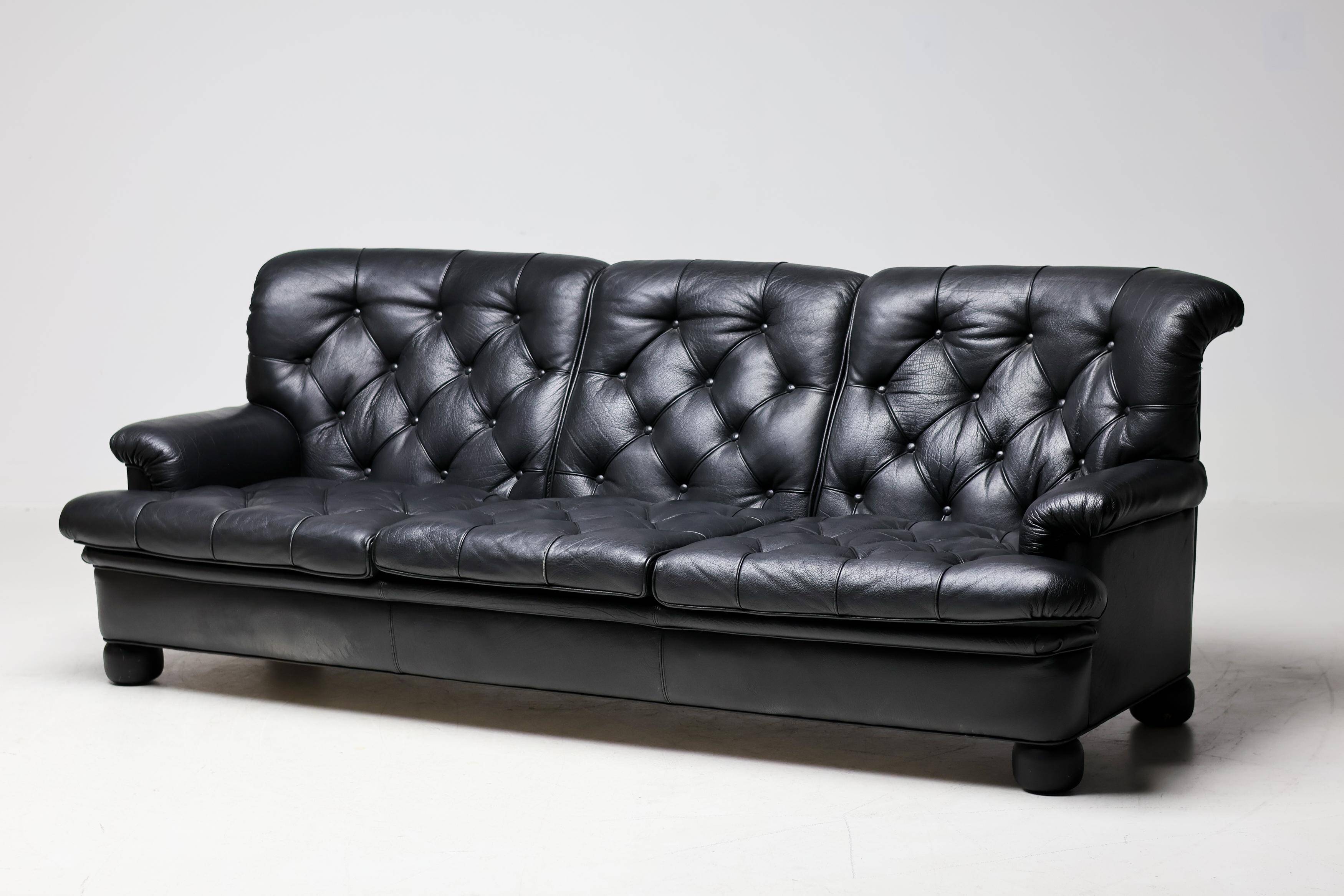 Three-seater sofa "Jupiter" in black leather by Arne Norell, Sweden, 1960.