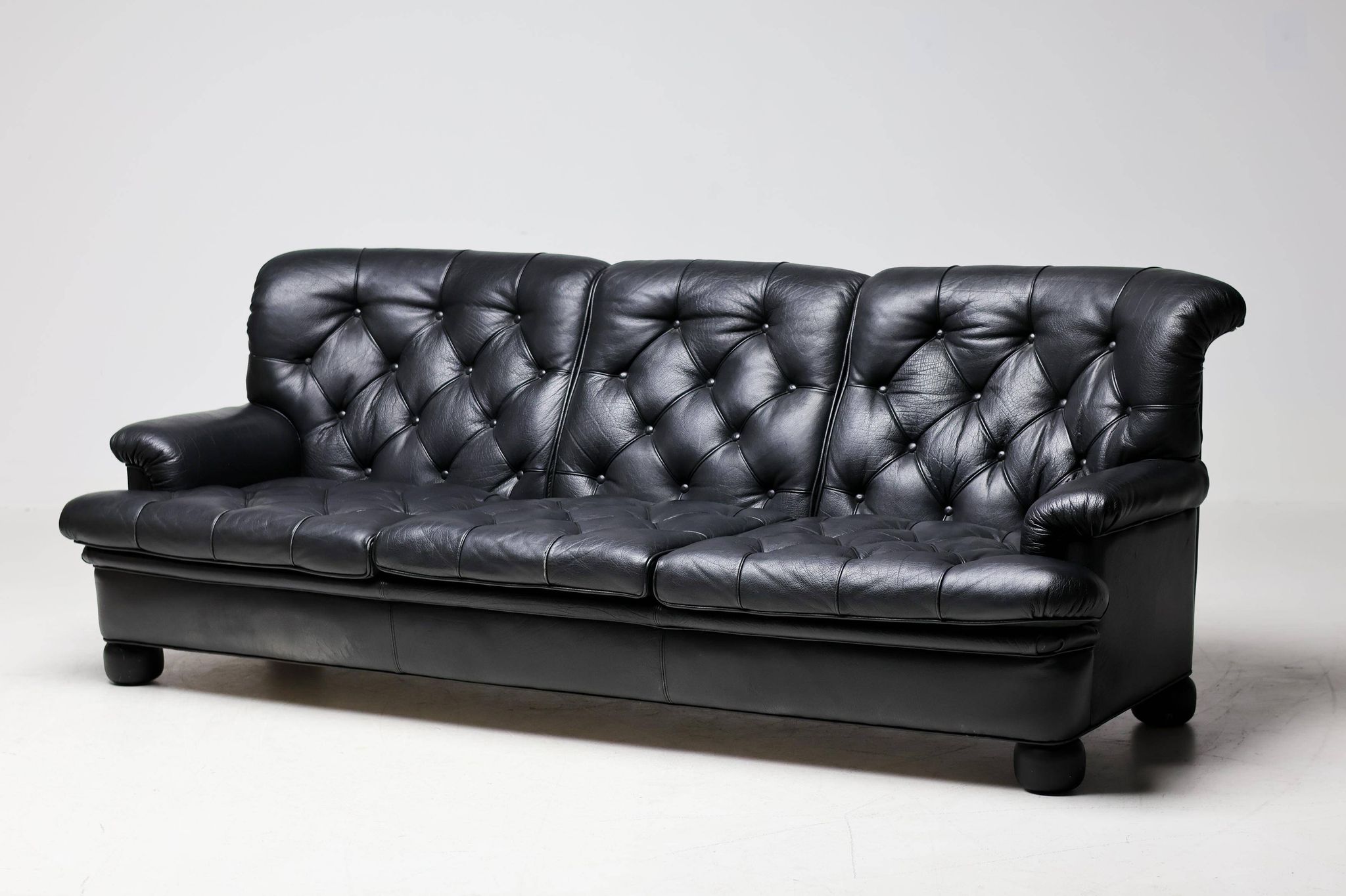 Three-seater sofa "Jupiter" in black leather by Arne Norell, Sweden, 1960.