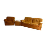 Tan leather sofa with natural graining, matching armchair and pouf
