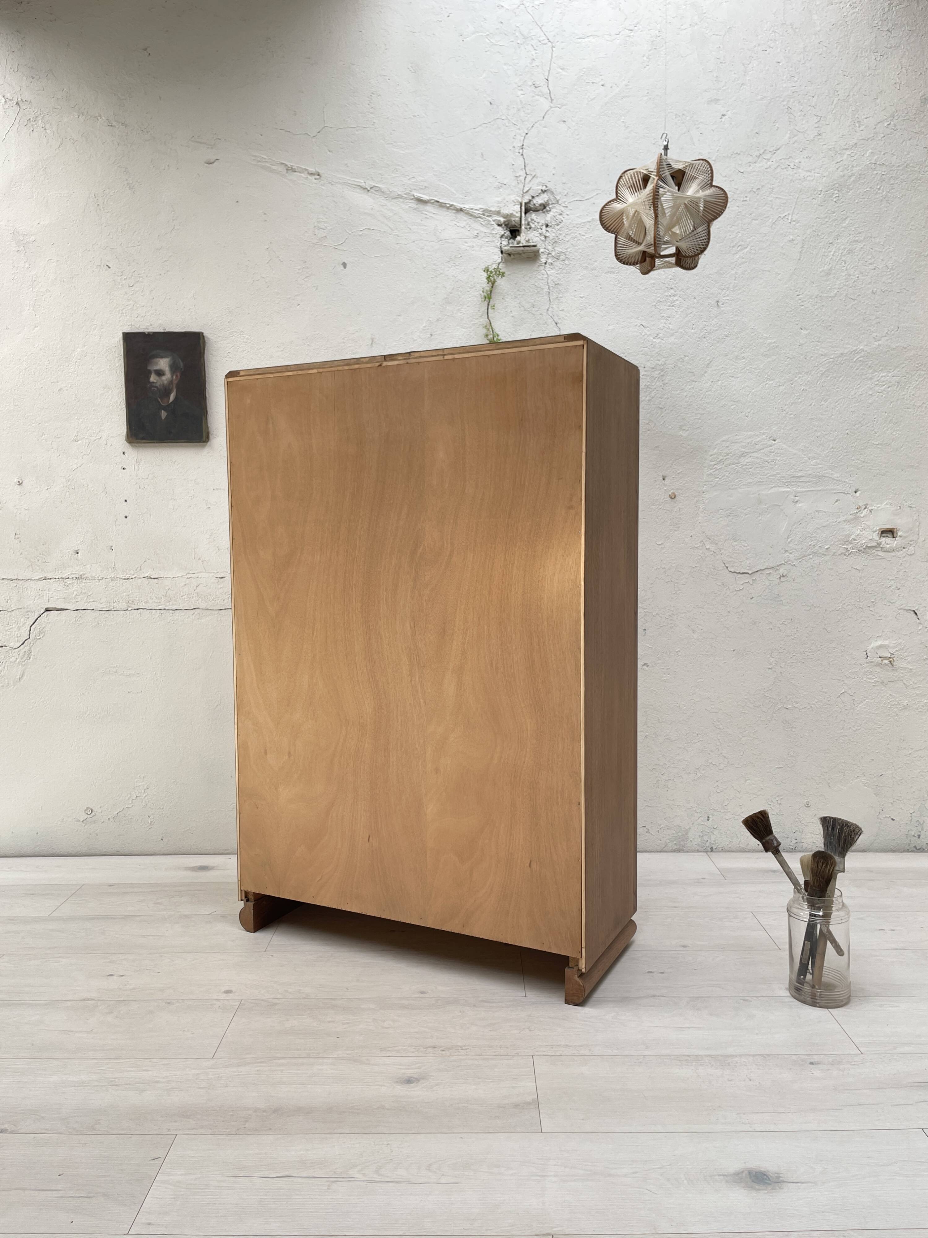 Storage unit in solid oak and veneer, circa 1960.