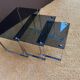 Set of 3 nesting tables in metal and smoked glass.