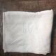 Antique linen sheet with LJ monogram