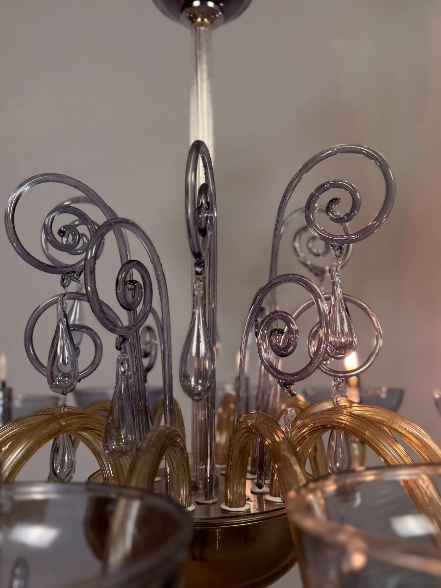 Venetian chandelier in blue and amber Murano glass, 12 light arms, circa 1980.