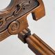 Vintage folding chair in carved wood