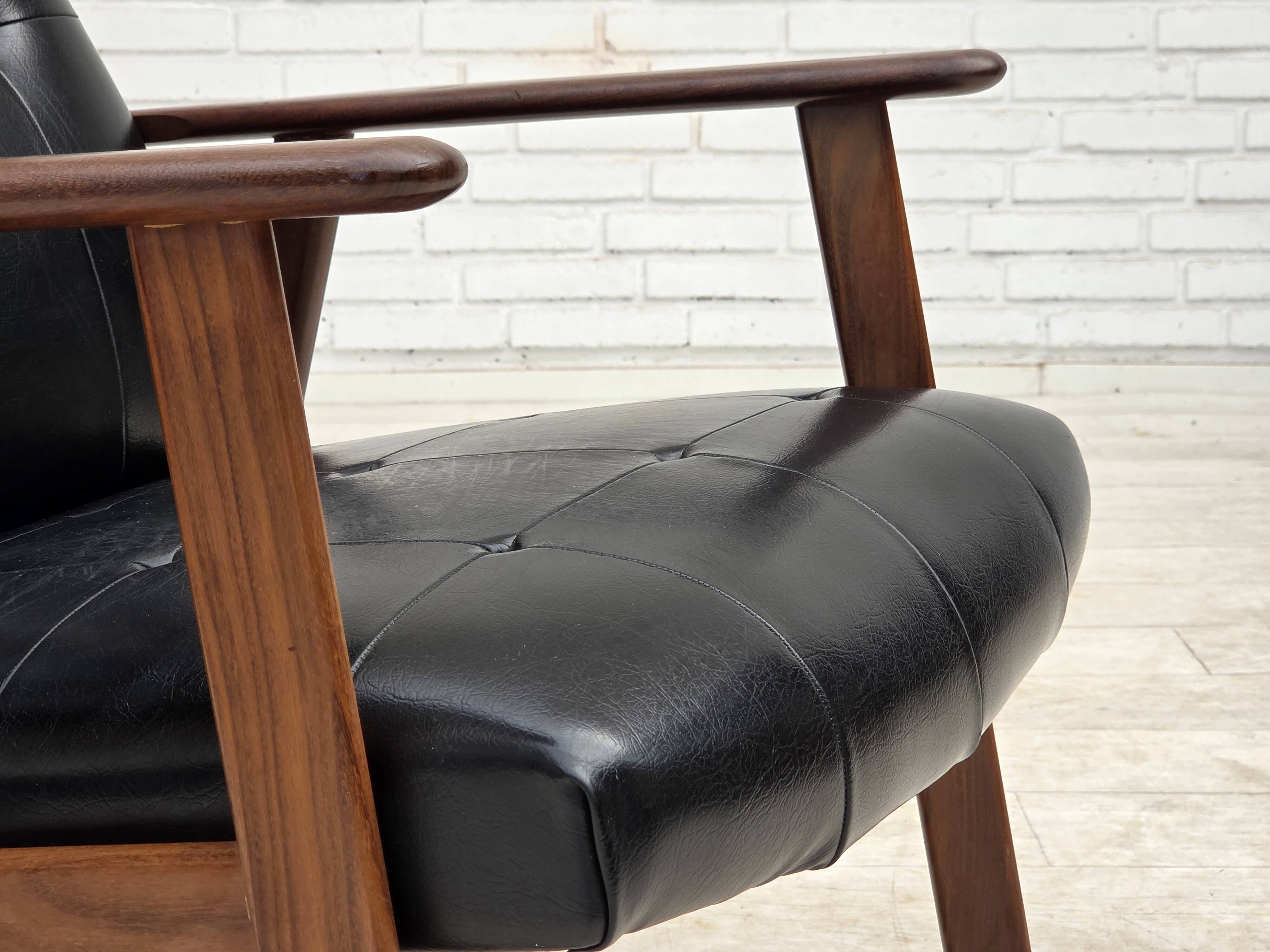 1970s, Danish armchair, black artificial leather, teak wood.