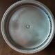 Old metal bowl on foot