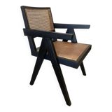 Black wooden armchair with caning