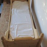 Retractable sofa bed of the Austrian Tyrole in natural wood