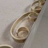 Vintage faceted mirror in an aluminium frame from the 1950s.