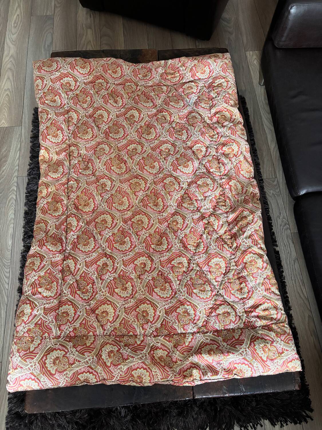 Vintage duvet/bedspread with a paisley pattern.