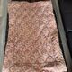 Vintage duvet/bedspread with a paisley pattern.