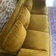 Mustard yellow retro three-seater sofa