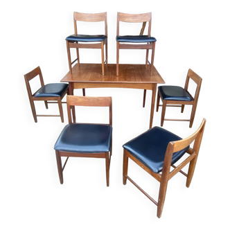 Set of 6 chairs and dining room table with extensions “BCM” circa 1960