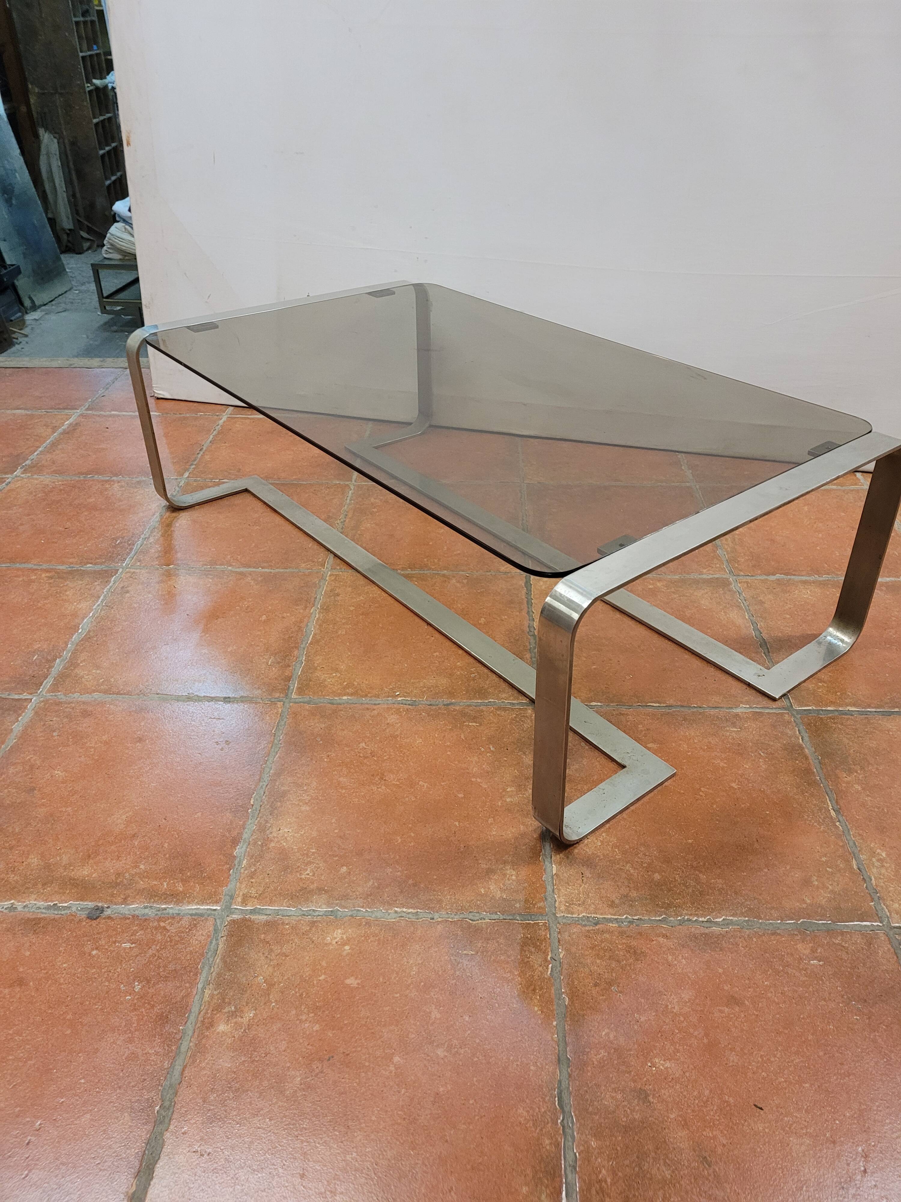 Coffee table with stainless steel base and smoked glass, from the 70s